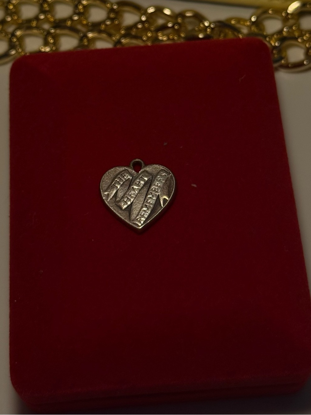 “The heart remembers” James Avery charm.